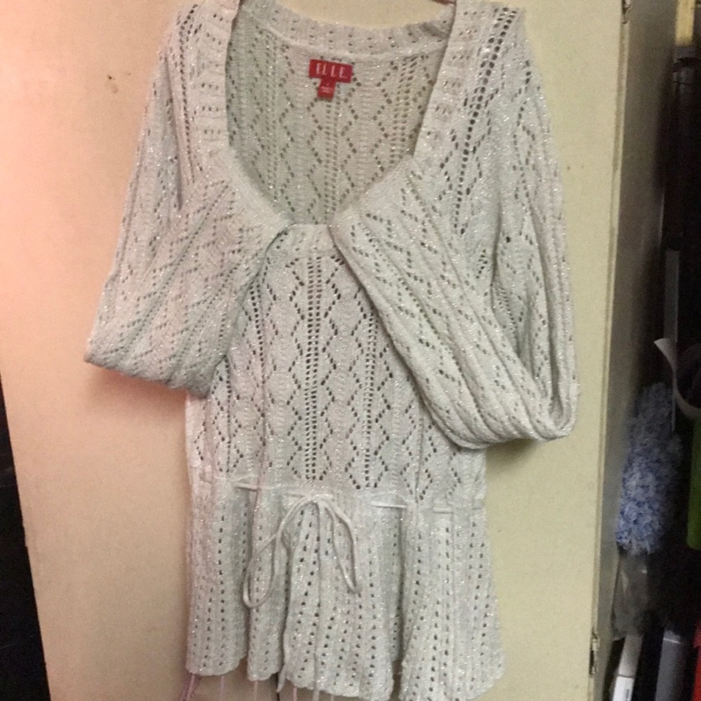 Metallic flecked ivory peplum sweater